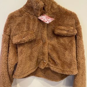 Very soft and warm. Never worn. New with tags.